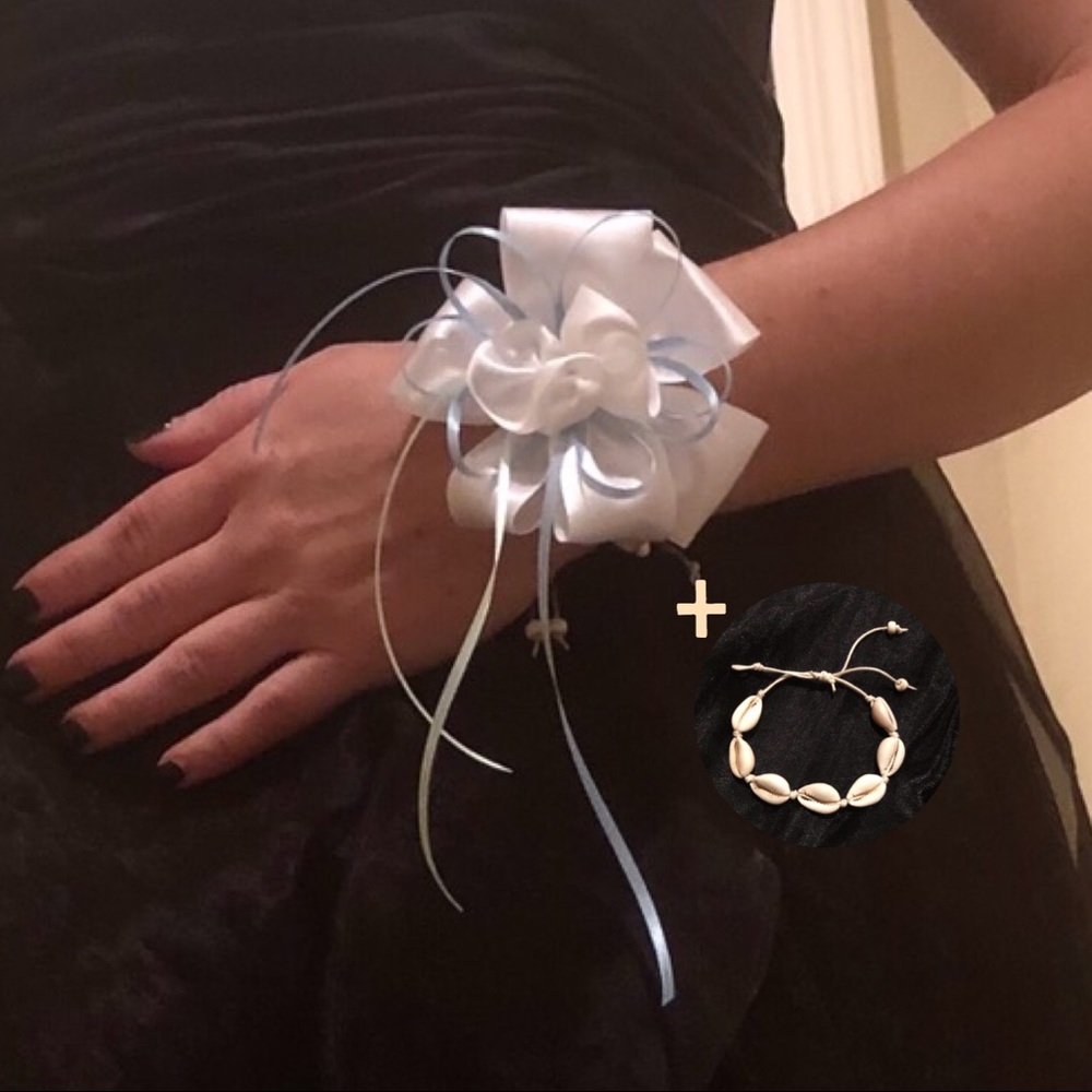 Ribbon wrist corsage on a Hawaiian shell bracelet